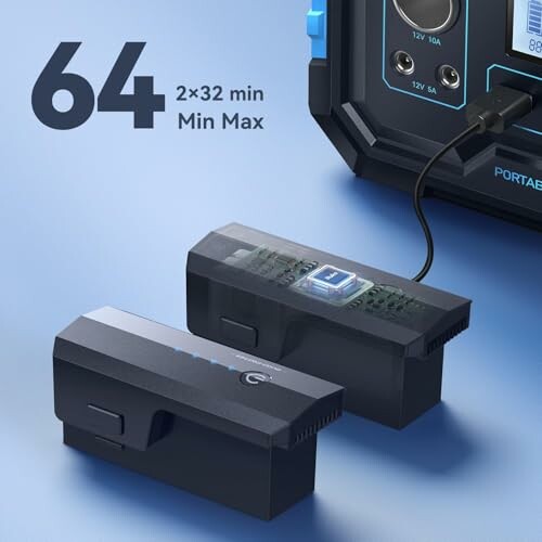 Two batteries charging at a portable power station.
