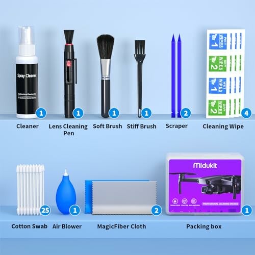 Camera cleaning kit with various tools and accessories.
