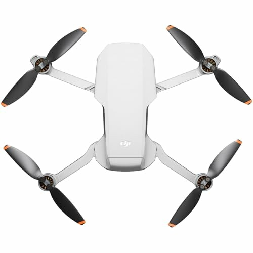 Top view of a compact drone with four propellers.