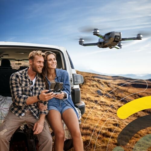 Couple sitting on vehicle trunk flying a drone in a scenic landscape.