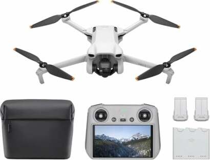 Drone with controller, carrying case, and batteries.