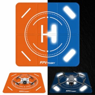 Drone landing pad with day and night modes, featuring a drone on each pad.