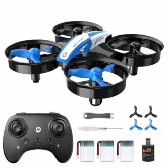 Mini drone with remote control and accessories including batteries and propellers.