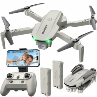Foldable drone with controller, smartphone mount, and spare batteries.